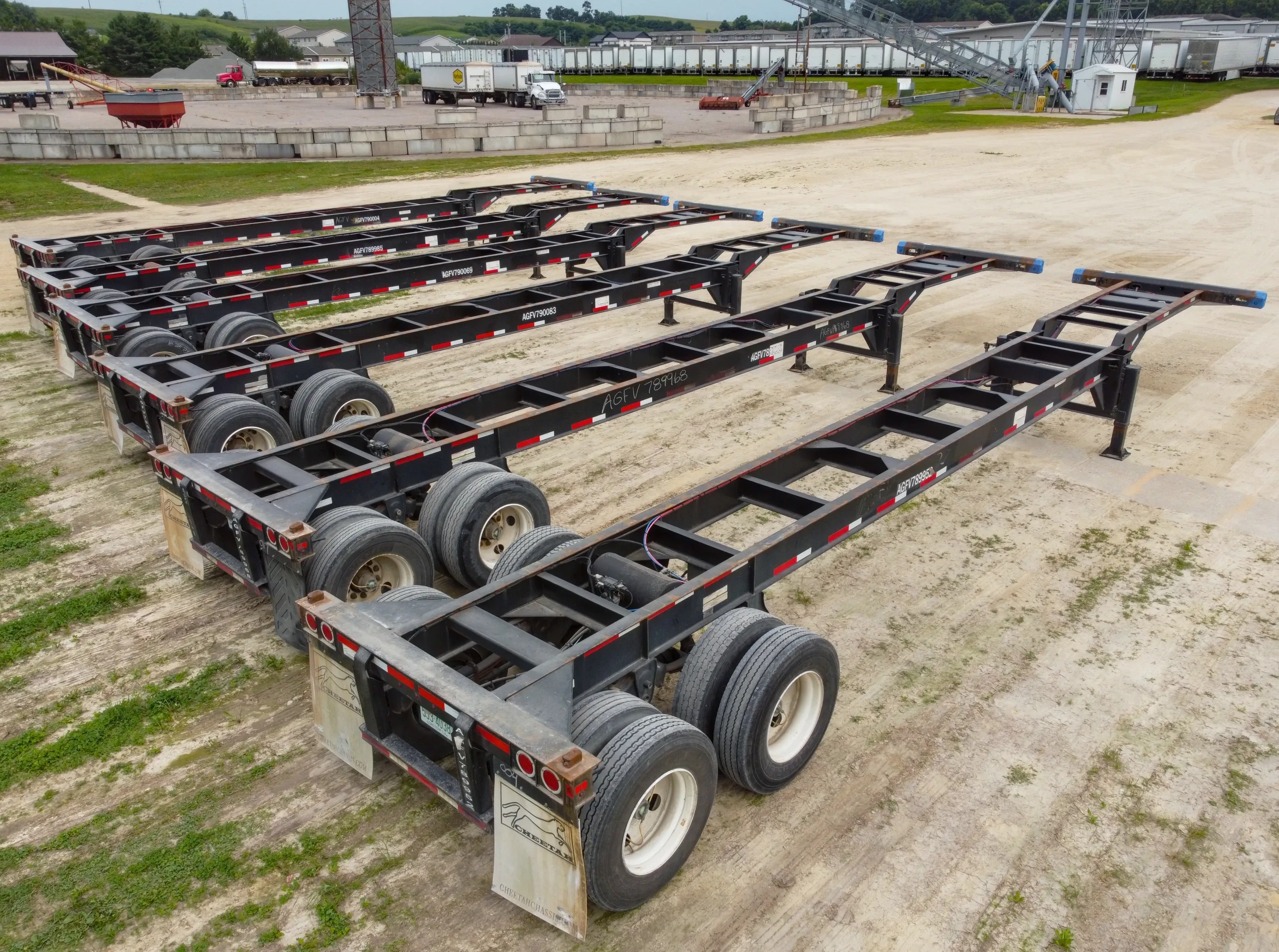 Row of empty 40-foot container chassis